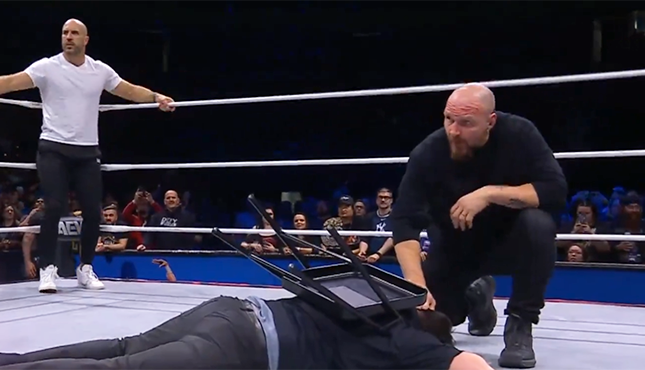 Jon Moxley Destroys Chuck Taylor, Christian Cage Revealed As Taz’s Assailant