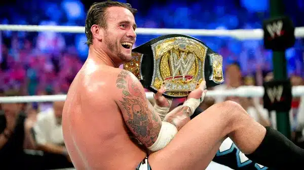 https://www.ewrestlingnews.com/wp-content/uploads/2024/12/cm-punk-wwe-champion.webp